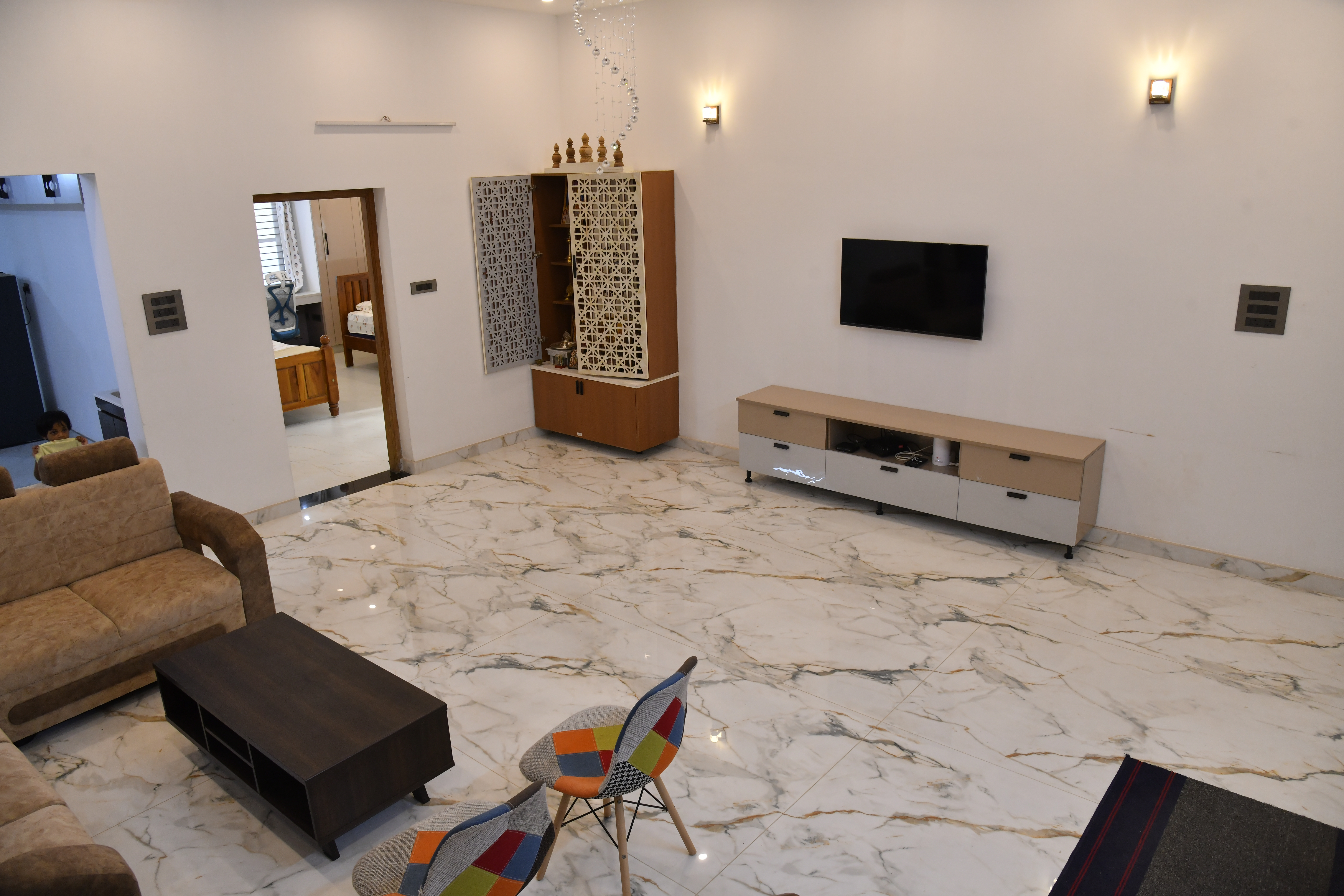 Warmly lit living room with sofa and coffee table