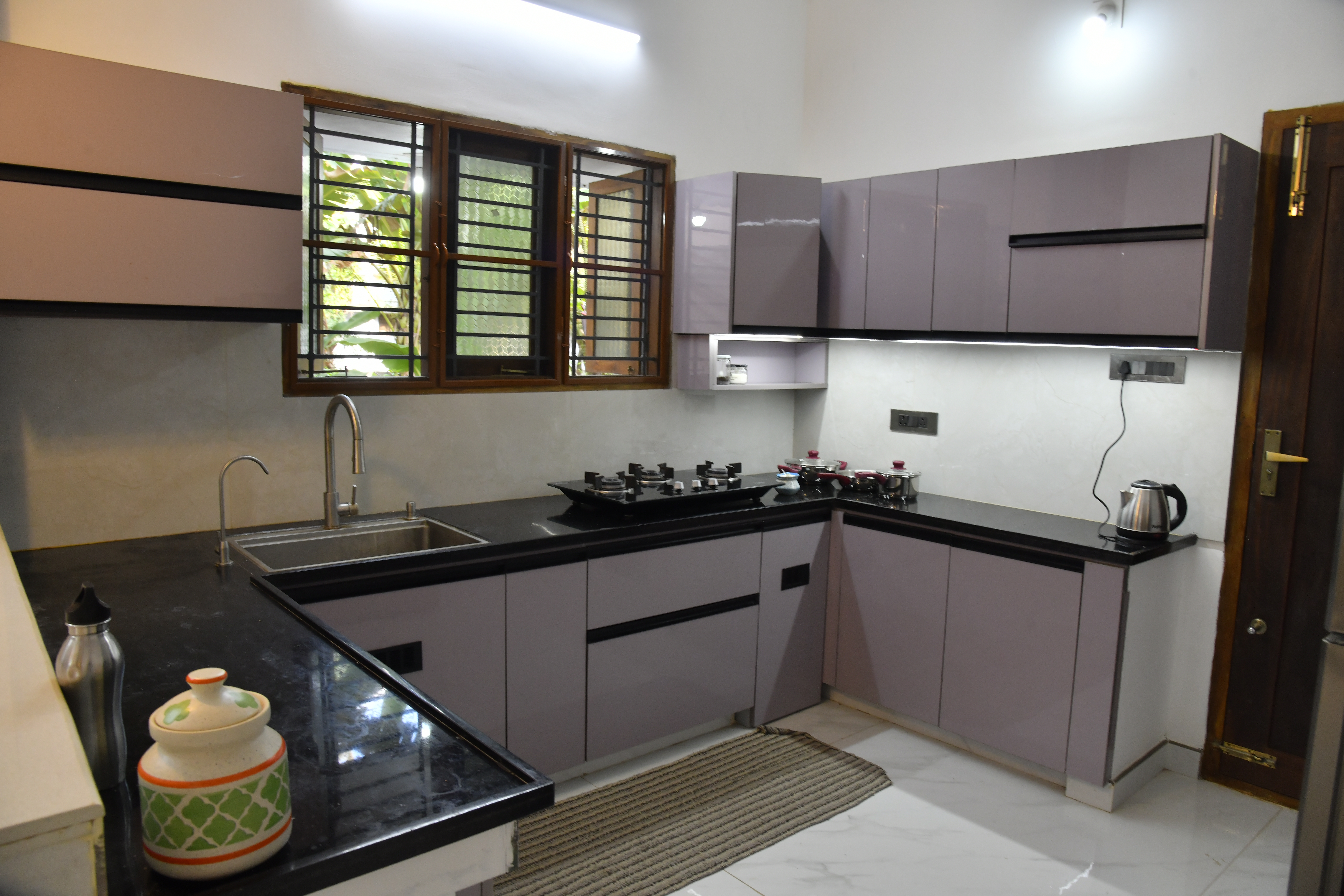 Well designed Modular Kitchen with Breakfast counter.